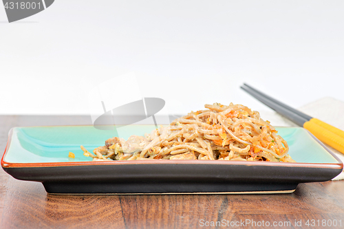 Image of China noodles with vegetables and meat