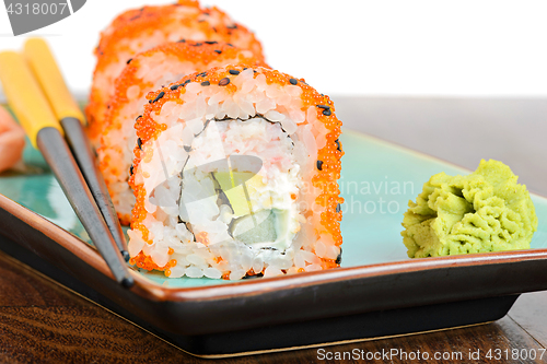 Image of California maki sushi with orange masago