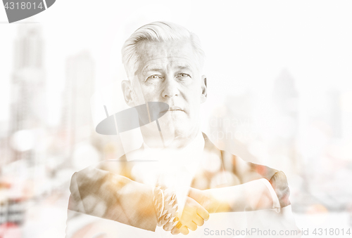 Image of Double exposure of senior businessman