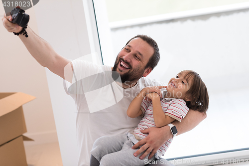 Image of selfie father and son