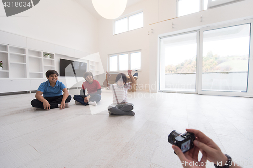 Image of young boys having fun on the floor