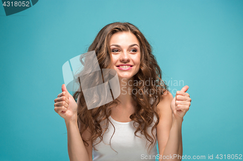 Image of The young woman\'s portrait with happy emotions