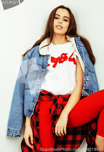 Image of young pretty teenage hipster girl posing emotional happy smiling on white background, lifestyle people concept 