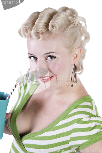 Image of Woman in pin-up dress drinking - Isolated