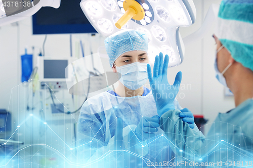 Image of surgeons in operating room at hospital