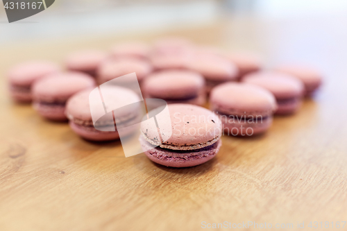 Image of macarons on table at confectionery or bakery