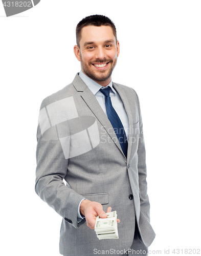 Image of smiling businessman with american dollar money