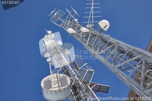 Image of Transmitter towers, blue sky