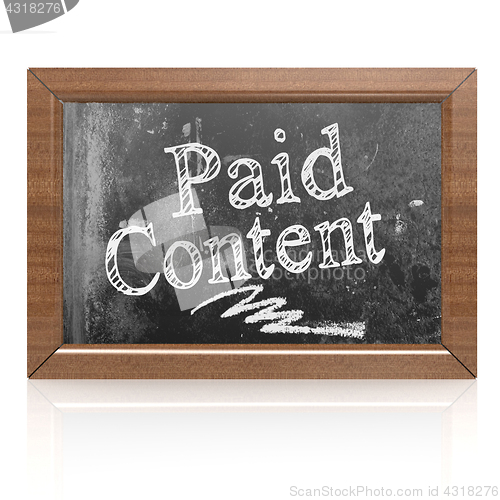 Image of Paid Content text written on blackboard