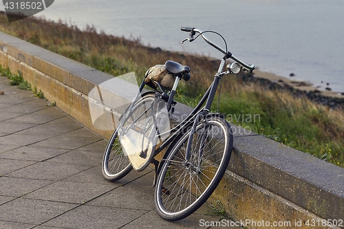 Image of Bicycle on the road along the river