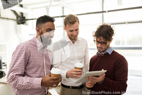 Image of business team with tablet pc and coffee at office