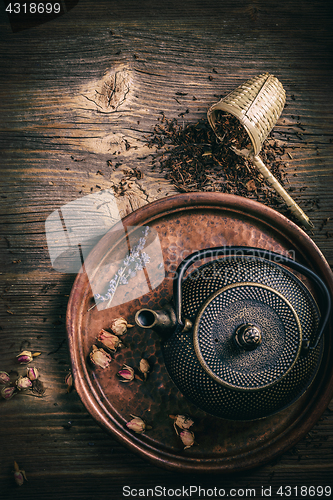 Image of Top view of iron asian tea set