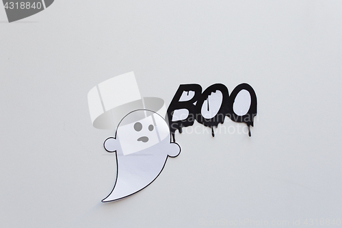 Image of ghost doodle and word boo on white background