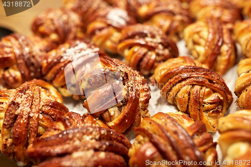 Image of close up of buns or pies at bakery