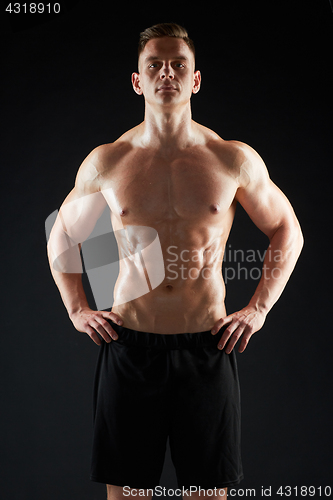 Image of young man or bodybuilder with bare torso