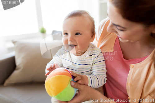 Image of happy young mother with little baby at home