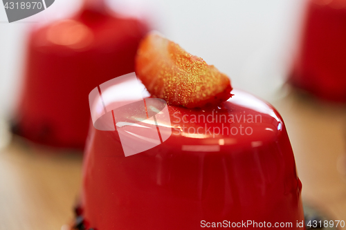 Image of close up of mirror glaze cake at confectionery