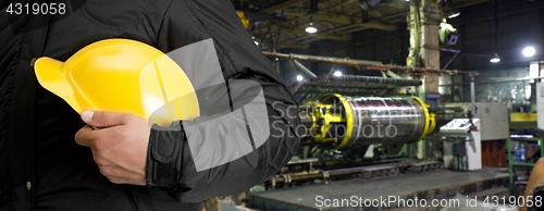 Image of Worker with safety helmet