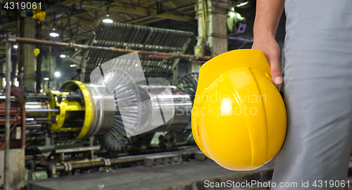 Image of Worker with safety helmet