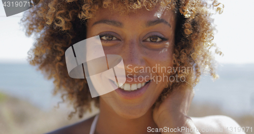 Image of Charming woman in sunlight