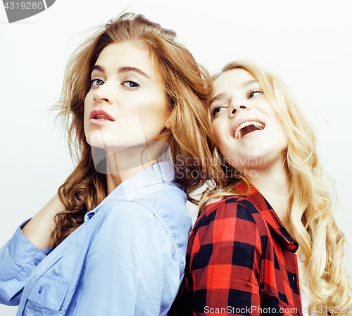 Image of best friends teenage girls together having fun, posing emotional on white background, besties happy smiling, lifestyle people concept close up