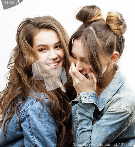 Image of best friends teenage girls together having fun, posing emotional on white background, besties happy smiling, lifestyle people concept close up