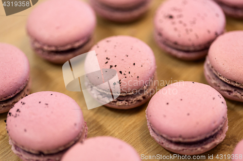 Image of macarons on table at confectionery or bakery