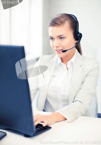 Image of friendly female helpline operator