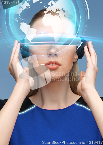 Image of woman in virtual reality 3d glasses with earth