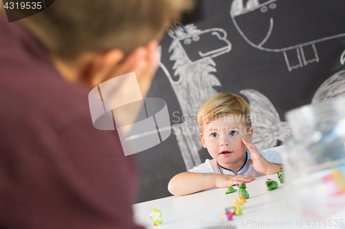 Image of Cute little toddler boy at child therapy session.