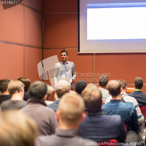 Image of Speaker Giving a Talk at Business Meeting.