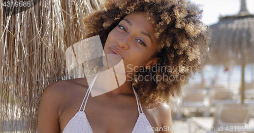 Image of Beautiful woman in tropical resort