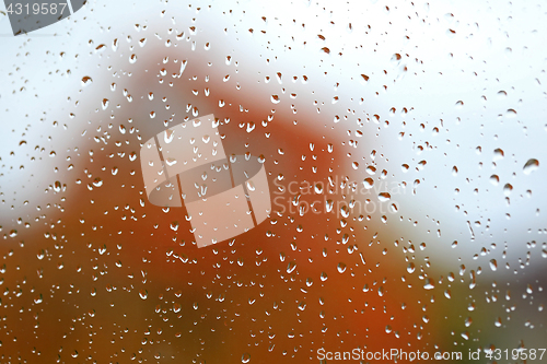 Image of Raindrops on Window in Autumn