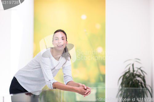 Image of portrait of a young beautiful woman at home