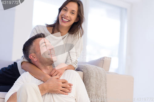 Image of couple hugging in their new home