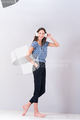 Image of woman with headphones isolated on a white