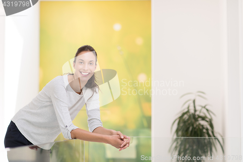 Image of portrait of a young beautiful woman at home