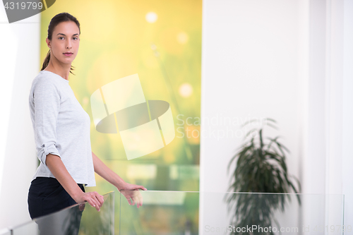 Image of portrait of a young beautiful woman at home