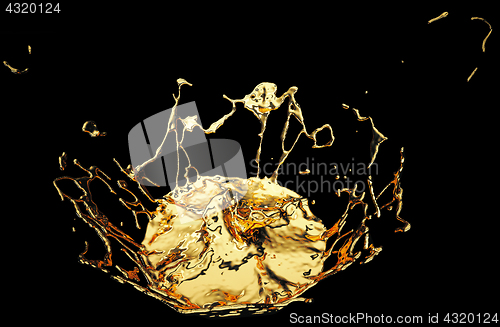 Image of Splashes or splatters of melted gold or oil isolated on black