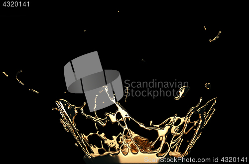 Image of Liquid gold or oil splashes isolated on black