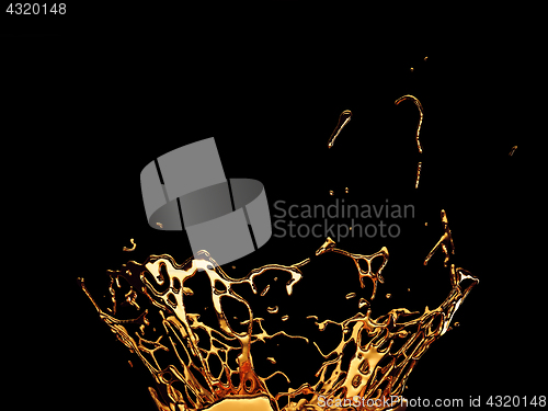 Image of Melted gold or oil splashes isolated on black