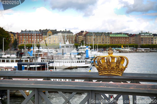 Image of Skeppsholmsbron (Skeppsholm Bridge) with Golden Crown on a bridg