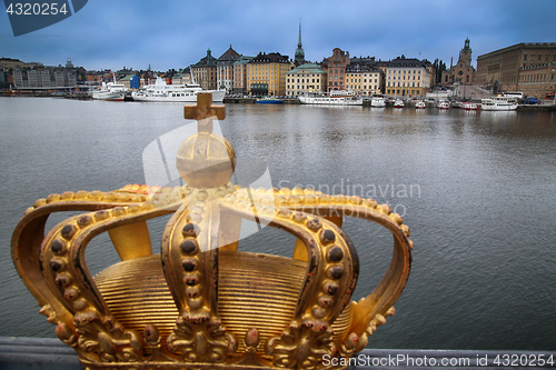 Image of Skeppsholmsbron (Skeppsholm Bridge) with Golden Crown on a bridg