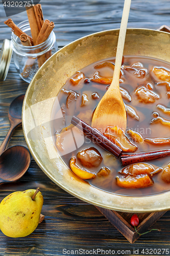 Image of Homemade jam from pears with cinnamon.