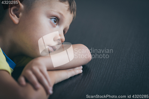 Image of Portrait of one sad little boy. 