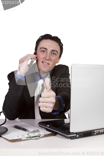 Image of Businessman at His Desk Working