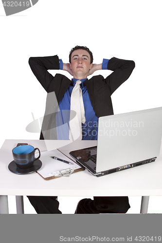 Image of Businessman at His Desk Working