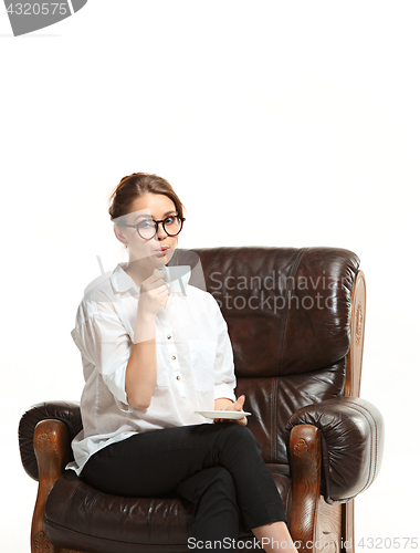 Image of attractive businesswoman have a coffee break