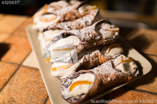 Image of pastry on plate at bakery