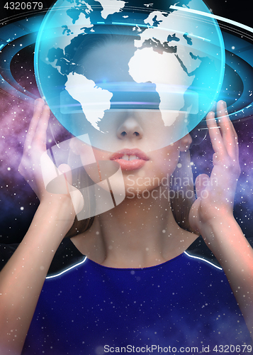 Image of woman in virtual reality 3d glasses with earth